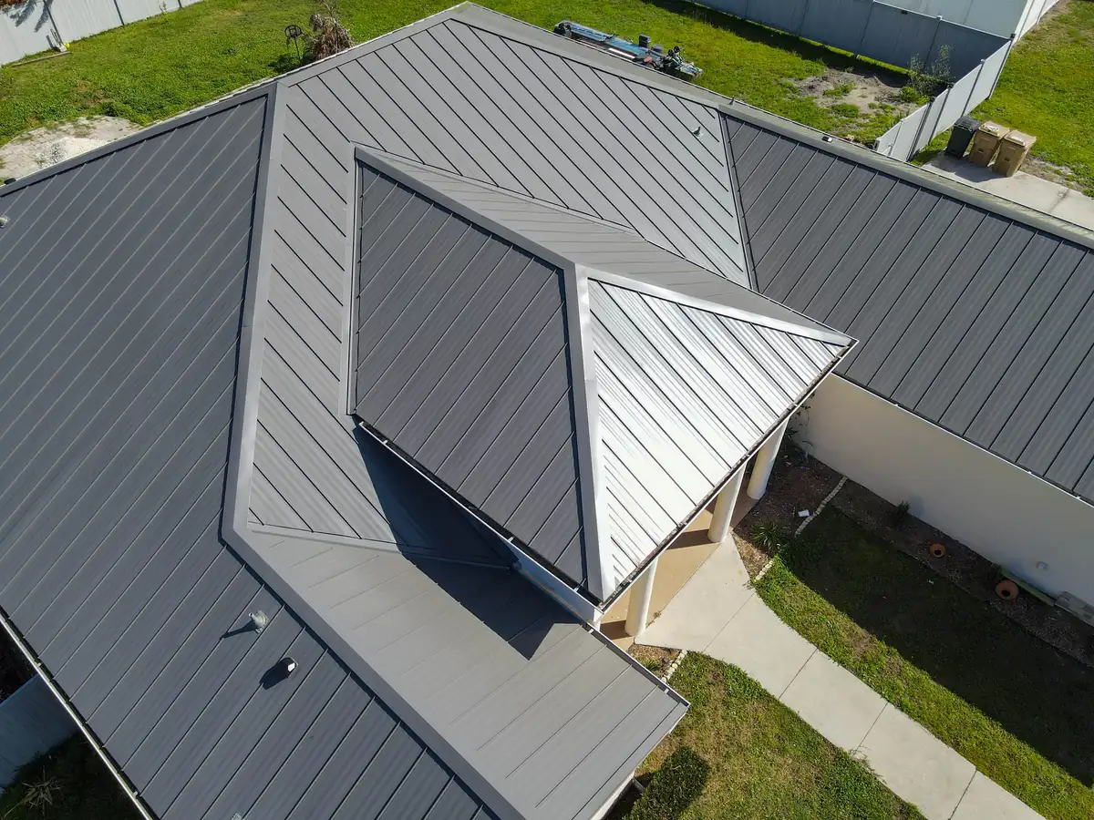 Grey standing seam metal roof installed in Kissimmee, Florida